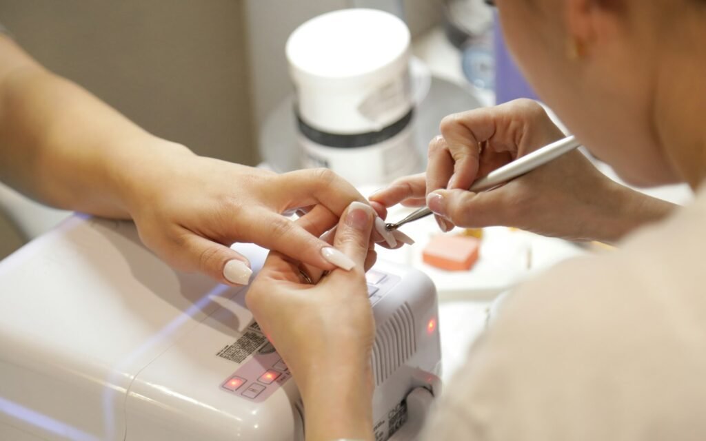 Manicure in progress at a clean nail salon station in Toronto